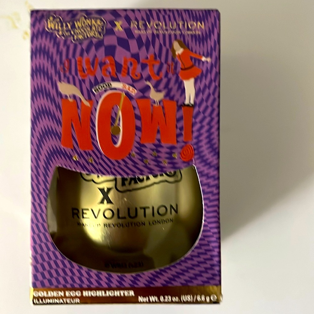 NIB! Revolution Golden Egg Highlighter. 0.23 ounces